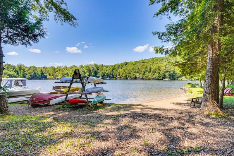 Kayaks and canoe at the shore